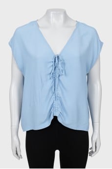Blue blouse with ties