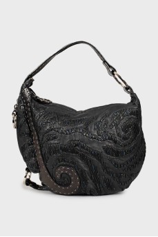 Leather hobo bag decorated with beads