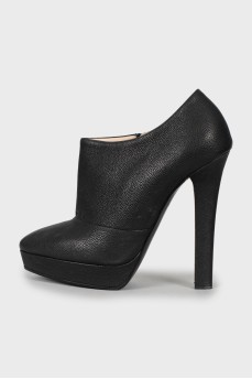 High-heeled leather ankle boots