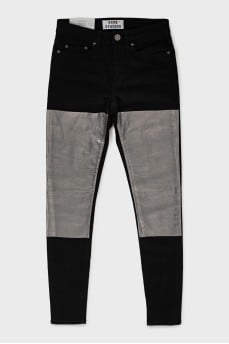Skinny jeans with silver inserts