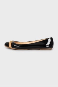 Black patent ballerinas