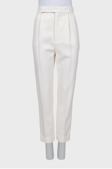 White trousers with tag