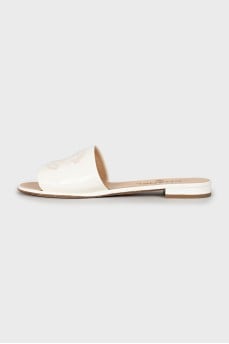 White slides with brand logo