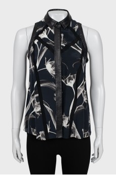 Sleeveless blouse with leather inserts