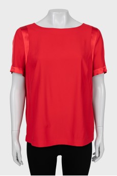 Red blouse with short sleeves