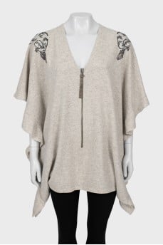 Cashmere cape decorated with rhinestones