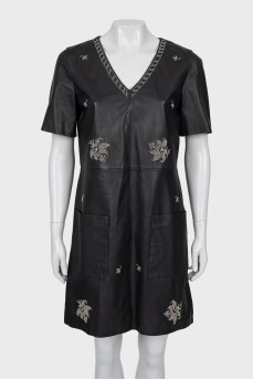Leather dress decorated with rhinestones