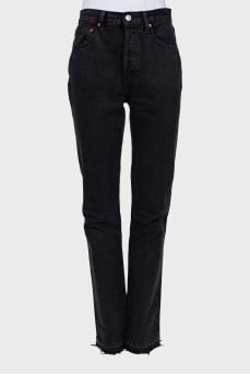 Jeans with slits and raw hem