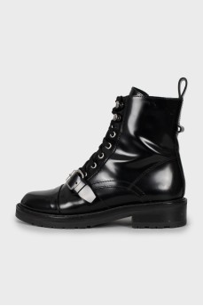 Black leather boots with silver hardware