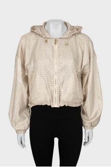 Cropped windbreaker with tag
