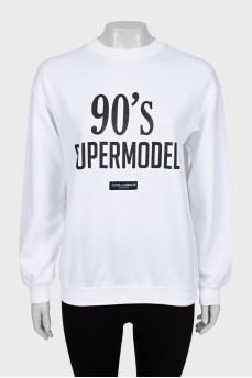Sweatshirt with black print and tag