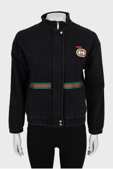 Denim jacket with signature patch and tag