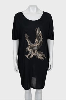 Loose fit dress decorated with beads