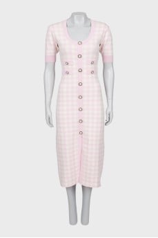 Plaid dress decorated with buttons