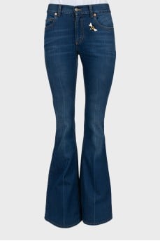 Flared jeans decorated with embroidery