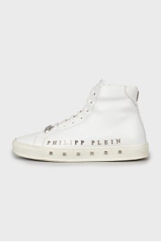 Leather sneakers decorated with studs