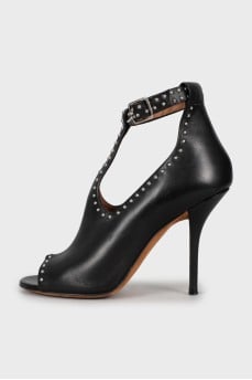 Black leather shoes with silver trim