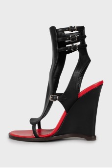 Leather sandals with shaped wedges