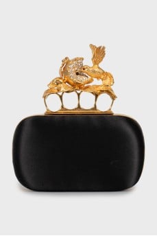 Textile clutch with golden decor