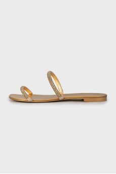 Golden slides decorated with rhinestones