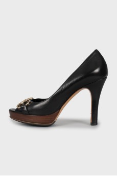 Leather shoes with wooden soles