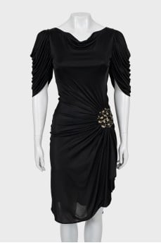 Black dress decorated with drapery