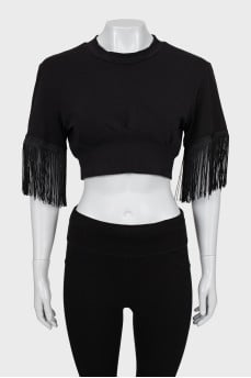 Black top decorated with fringe