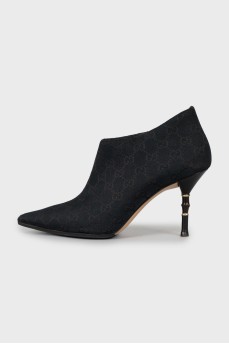 Pointed toe printed ankle boots