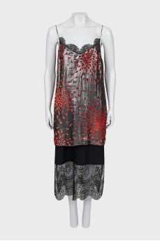Dress with straps decorated with weaving