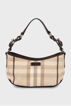 Bag made of textile and leather in a signature print