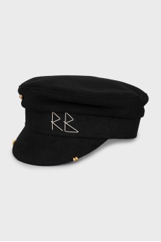 Wool cap with golden decoration