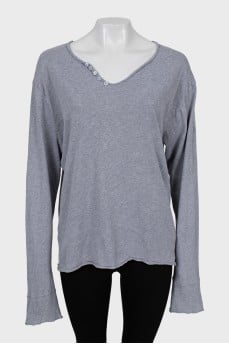 Gray long sleeve with a patch on the back