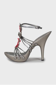 Silver sandals decorated with beads