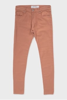 Pink skinny jeans with tag