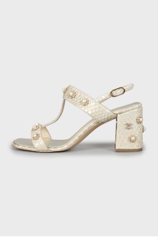 Snakeskin sandals with decor