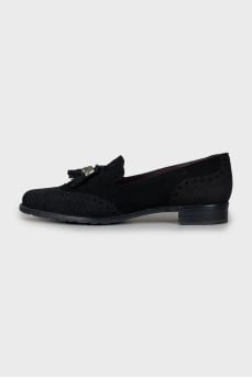 Suede shoes decorated with tassels