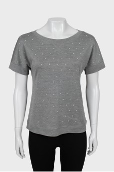 Straight T-shirt decorated with rhinestones
