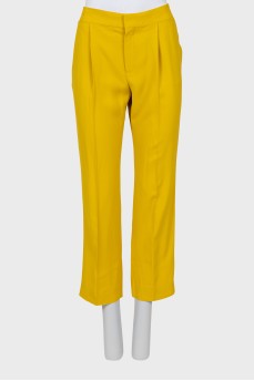 Yellow trousers with arrows