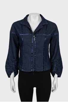 Denim jacket with decorated seams