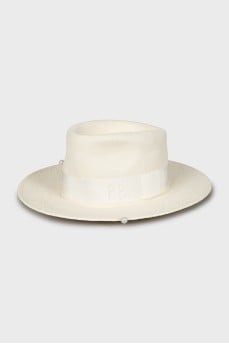 Straw hat decorated with beads