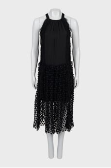 Sleeveless dress decorated with fringe