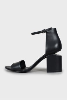 Leather sandals with figured heels