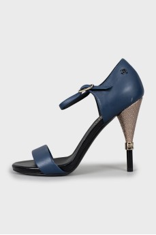 Leather sandals with decorative heels