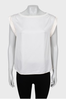 White blouse with slits on the sides
