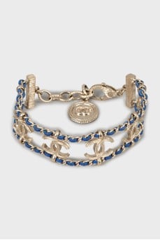 Bracelet with weave and signature logo