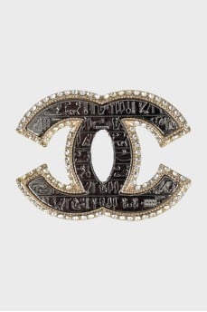 Logo brooch with rhinestones