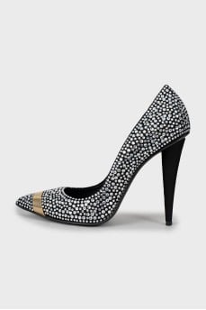 Suede shoes decorated with rhinestones