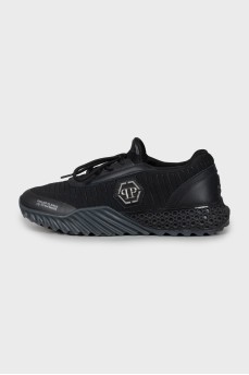 Black sneakers with silver logo