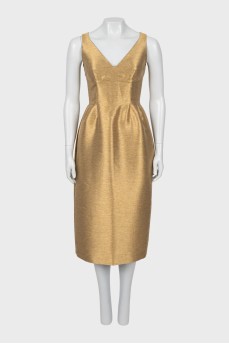 Golden dress with a slit at the back