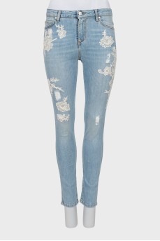 Skinny jeans with patches